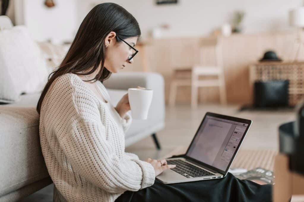 Image of a laptop with a freelance writing website open on the screen