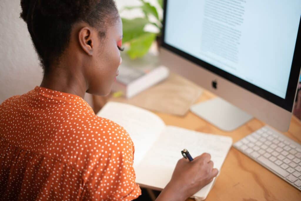 Image of a person evaluating different freelance writing platforms