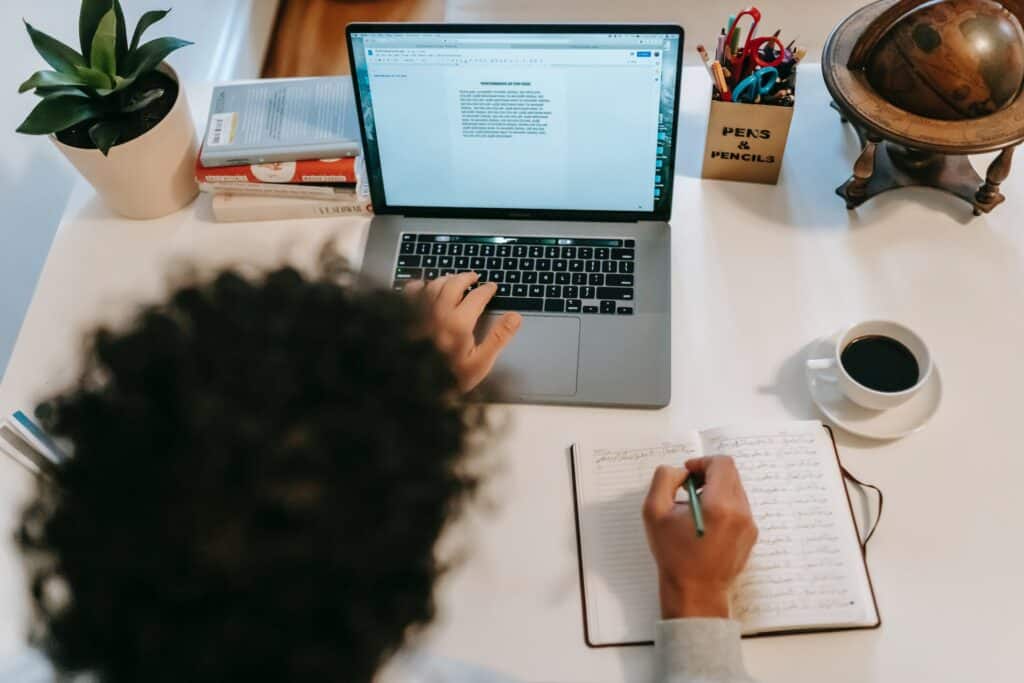 A freelance writer working on a laptop